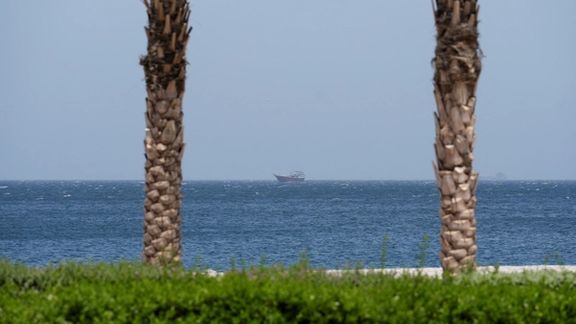A boat is off the coast of Musandam governorate, overlooking the Strait of Hormuz, in Musandam governance, in Oman, on April 8, 2026.