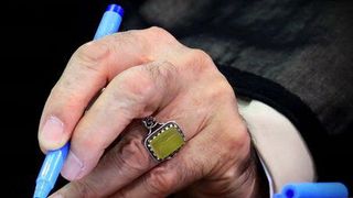 Iran Daily Banned Over Graphic Of Khamenei's Hand Drawing Poverty Line