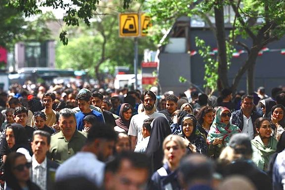 People walk near Tehran's Grand Bazaar, April 21, 2026