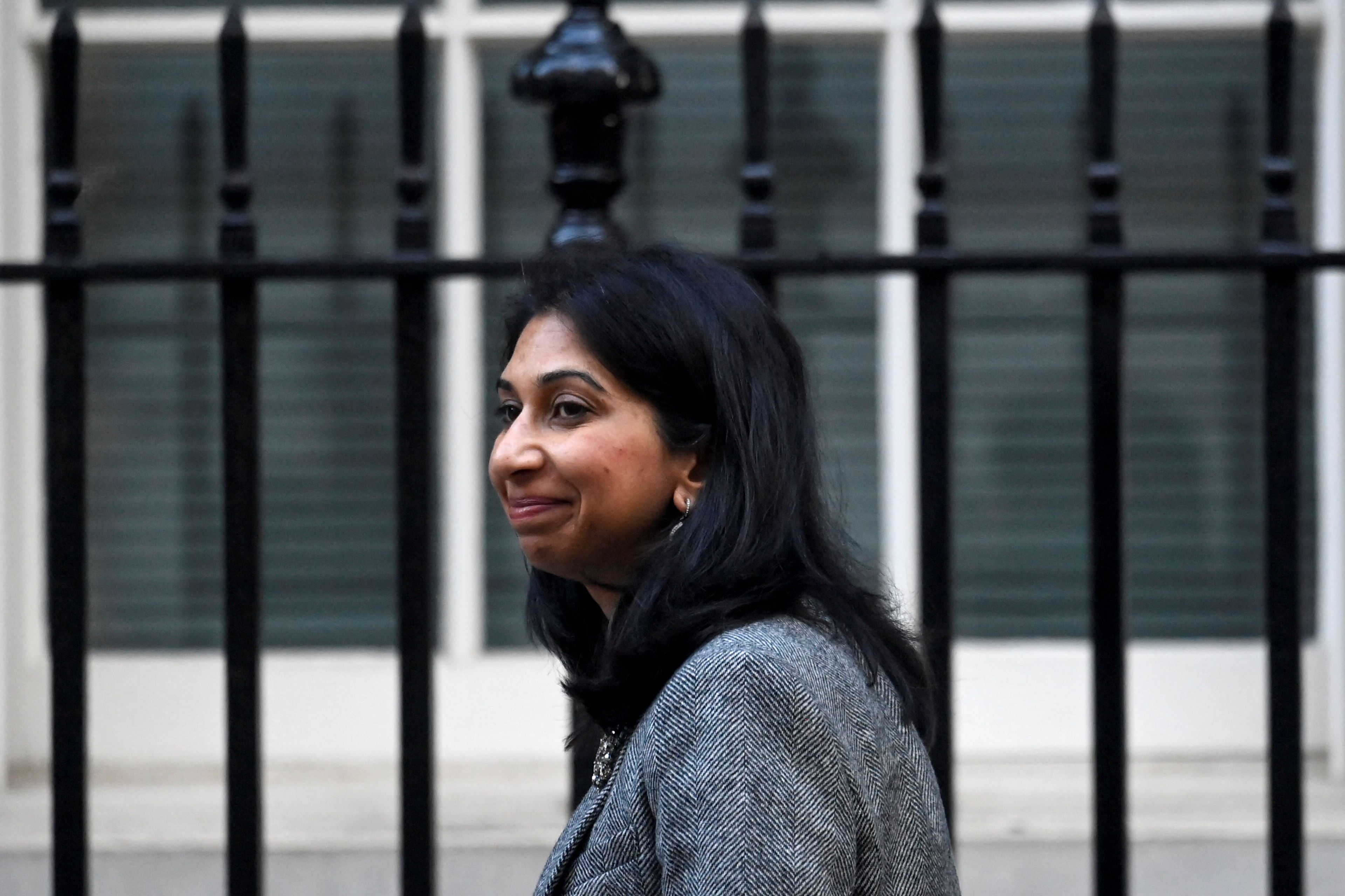 Britain's Secretary of State for the Home Department Suella Braverman walks outside Number 10 Downing Street in London, Britain, October 18, 2022. 