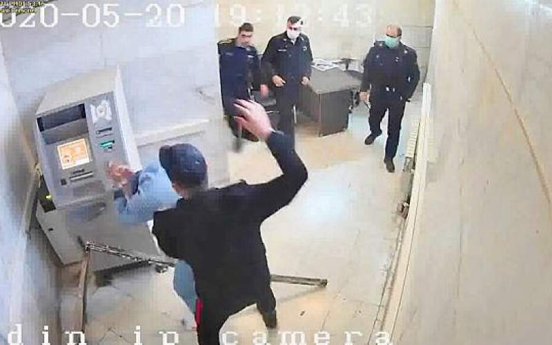 Hackers released this photo from Evin prison in 2021 showing guards assaulting a prisoner.