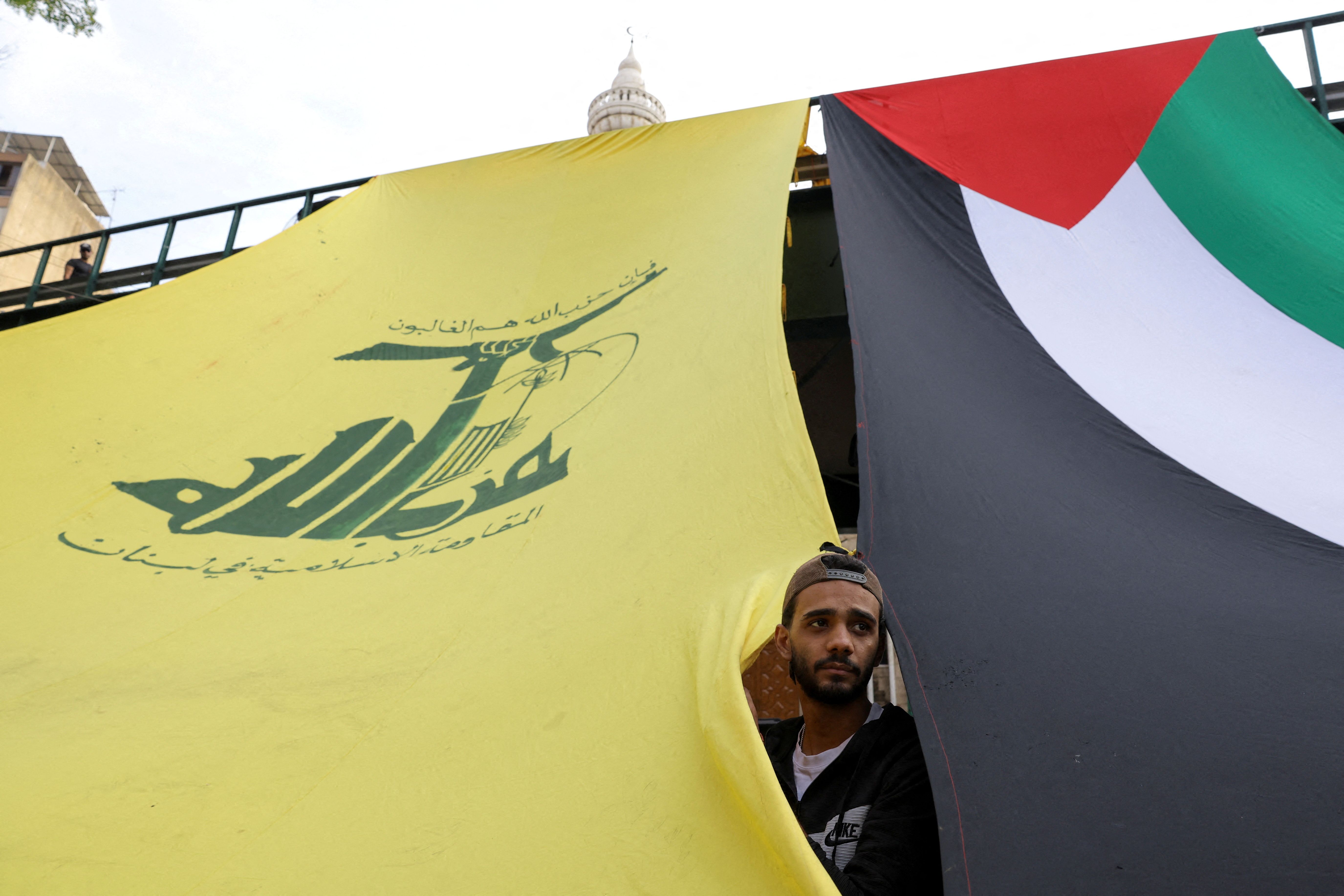 A man looks on, as Hezbollah supporters protest in solidarity with Palestinians in Gaza, amid the ongoing conflict between Israel and Palestinian Islamist group Hamas, in Beirut, Lebanon, October 27, 2023.