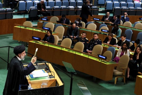 Iran's President Ebrahim Raisi holds up the holy Quran as he addresses the 78th Session of the UN General Assembly in New York City, US, September 19, 2023.