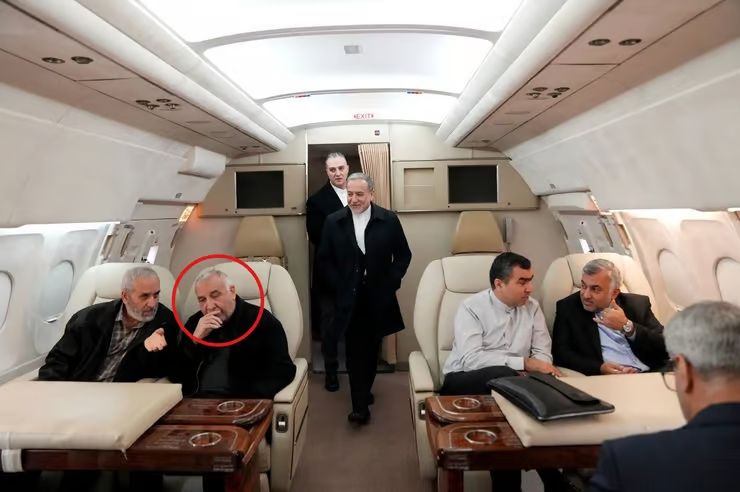 Mohammad Ebrahim Taherianfard (circled) onboard a plane to Beirut in January alongside Foreign Minister Abbas Araghchi  
