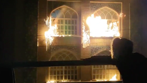A seminary in flames in the Shiite religious center of Qom on Nov. 18, 2022