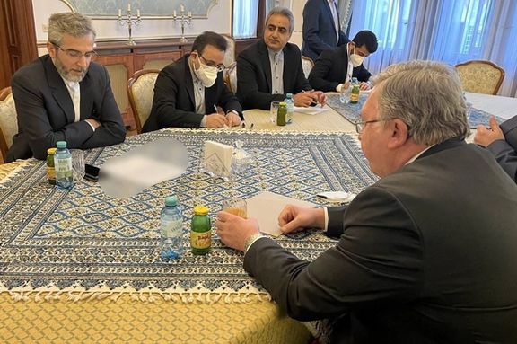 Iran's chief negotiator Ali Bagheri-Kani (L) meeting Russia's Ulyanov.