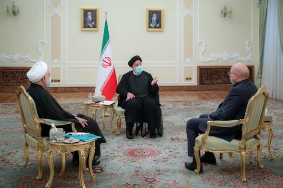 Iranian President Ebrahim Raisi (center) and Iranian parliament speaker Mohammad Bagher Ghalibaf (right) and the country’s chief justice Gholam-Hossein Mohseni-Ejei