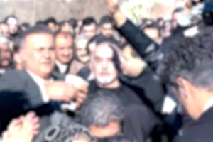 Iranians burying slain protest youths mourn with dancing and defiance