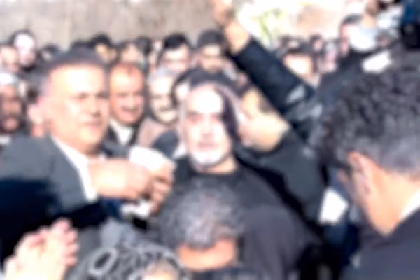 Iranians burying slain protest youths mourn with dancing and defiance