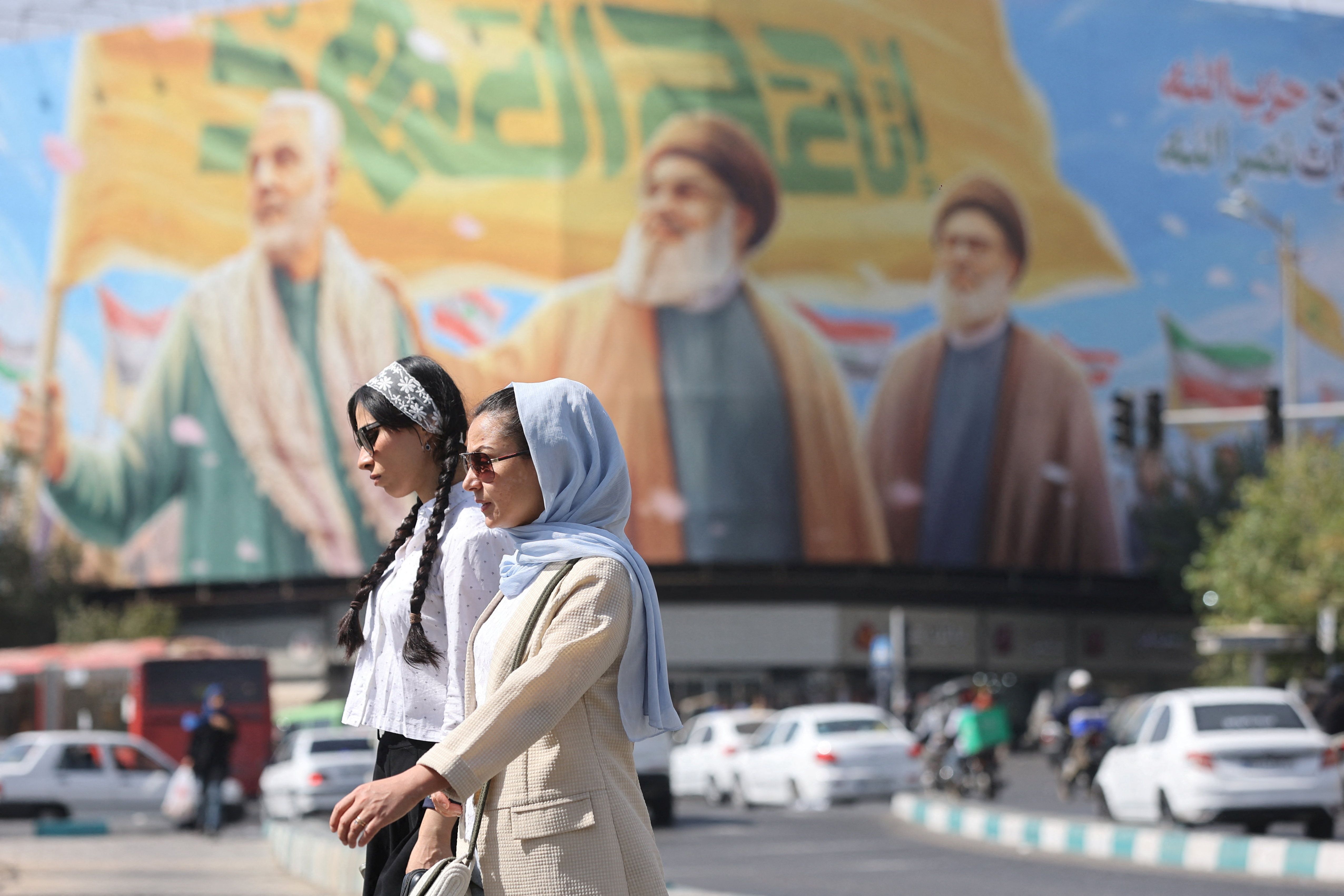 Conservatives clash over hijab law as Tehran streets move on