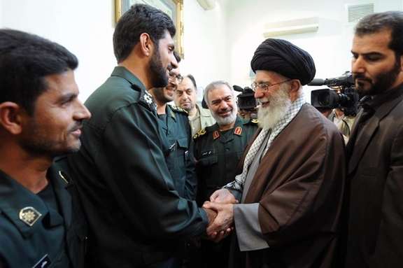 Iran's ruler Ali Khamenei meeting Col. Jafari in this undated photo
