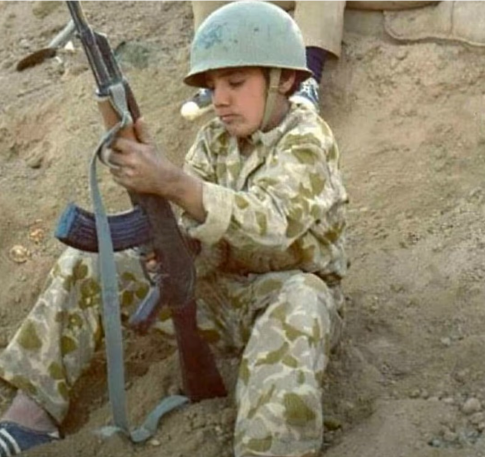 File photo showing a child at the front line during the Iran-Iraq War.