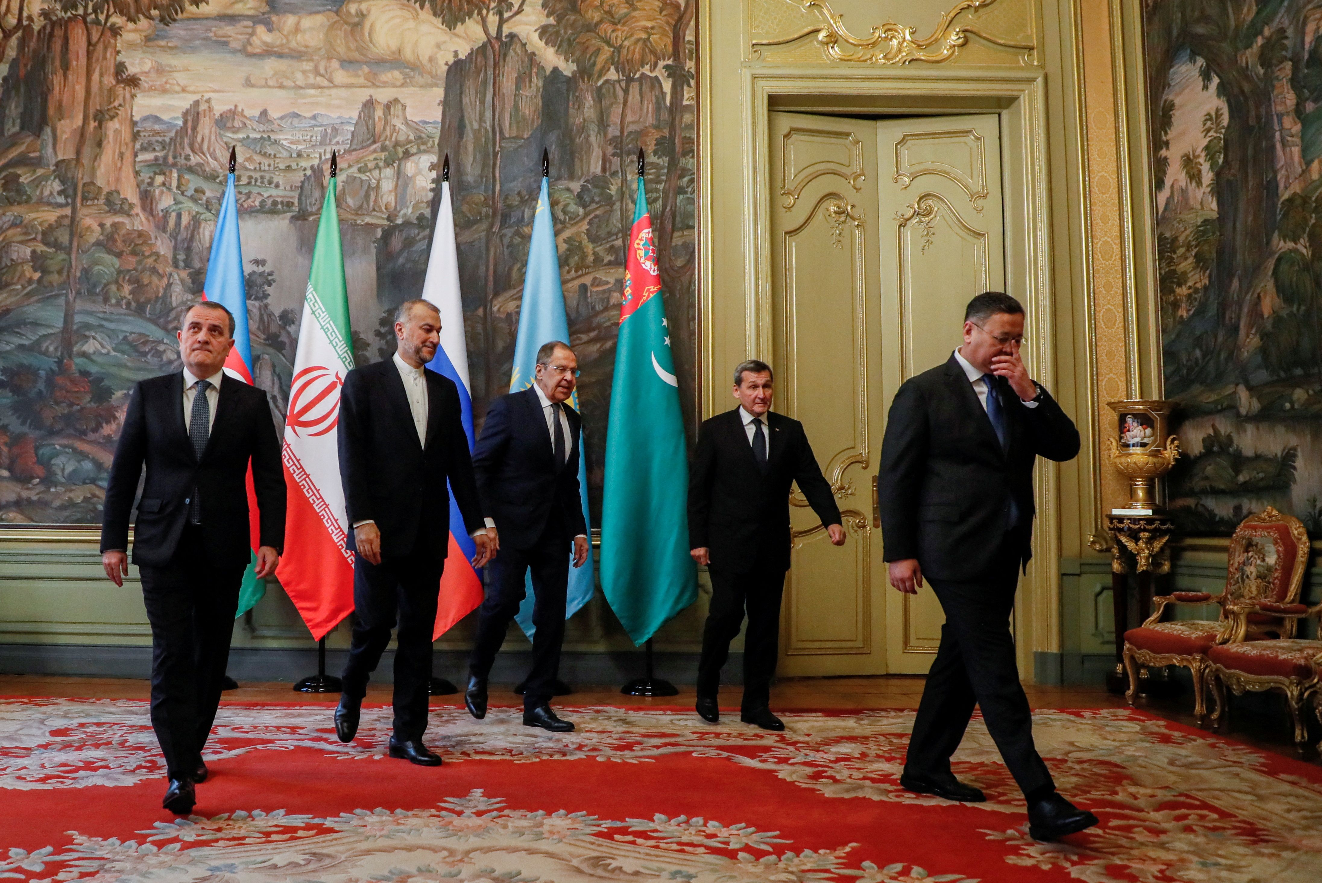 Azerbaijan's Foreign Minister Jeyhun Bayramov, Iran's Foreign Minister Hossein Amir-Abdollahian, Russian Foreign Minister Sergey Lavrov, Kazakhstan's Foreign Minister Murat Nurtleu and Turkmenistan's Deputy Prime Minister and Foreign Minister Rashid Meredov walk after a family photo ceremony at the annual meeting of the Caspian Sea littoral states, known as the 'Caspian Five' in Moscow, Russia December 5, 2023. 