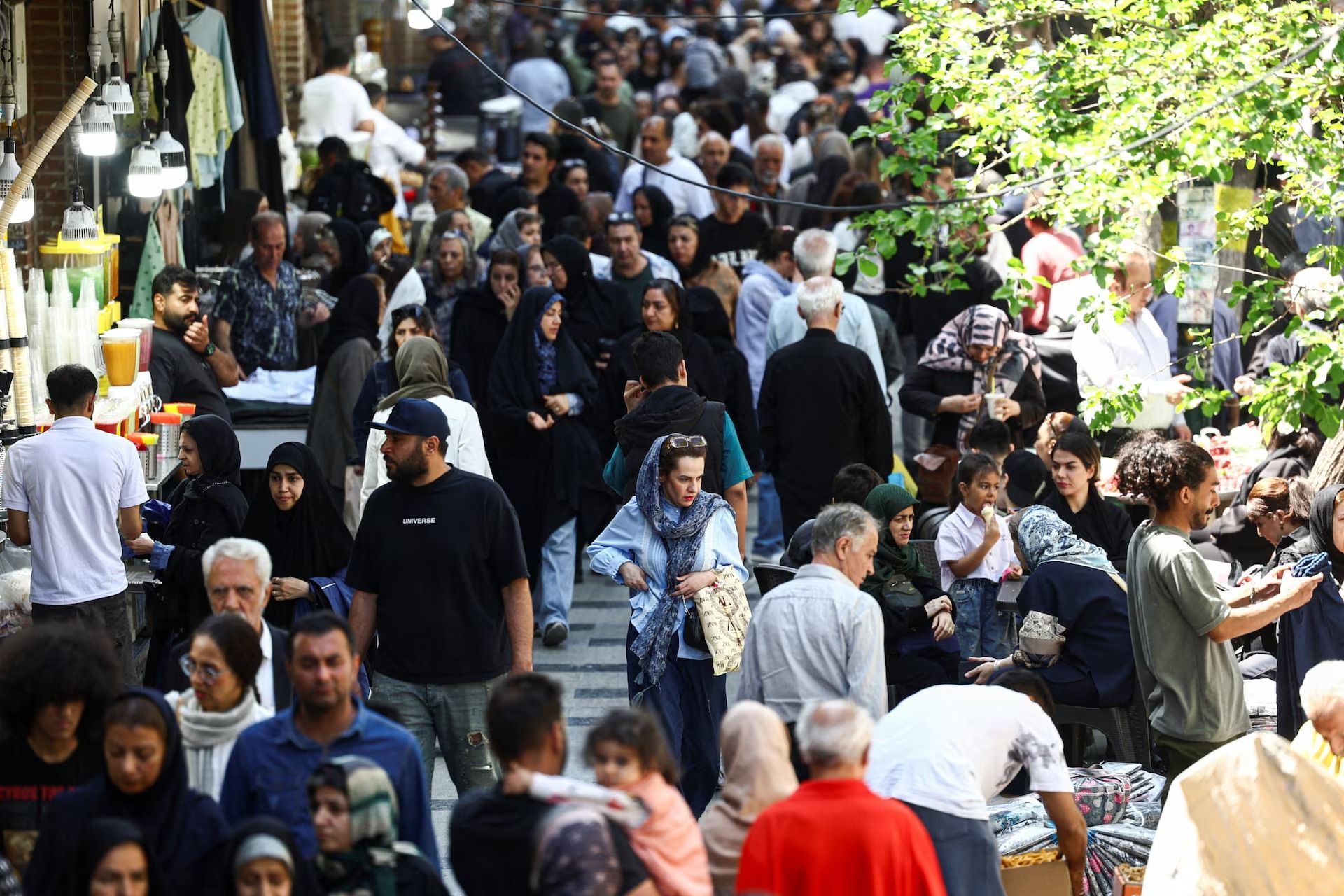 Inflation spikes, basic goods slip out of reach for Iranians, citizens say