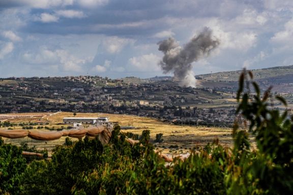 Smoke rises above south Lebanon following an Israeli strike amid ongoing cross-border hostilities between Hezbollah and Israeli forces, as seen from Israel's border with Lebanon in northern Israel, May 5, 2024.