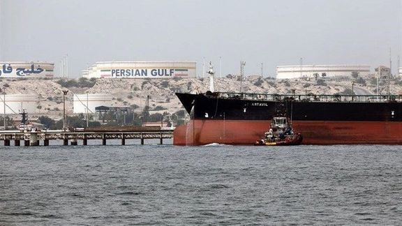 Iranian oil tanker at loading dock in the Persian Gulf. August 2021
