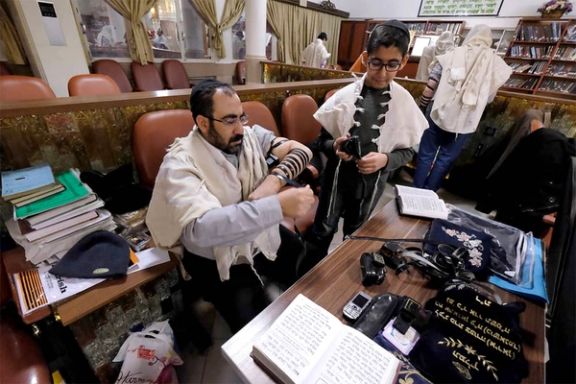 Iranian Jews preparing for prayers at the Abrishami synagogue at Tehran’s Palestine street (undated)