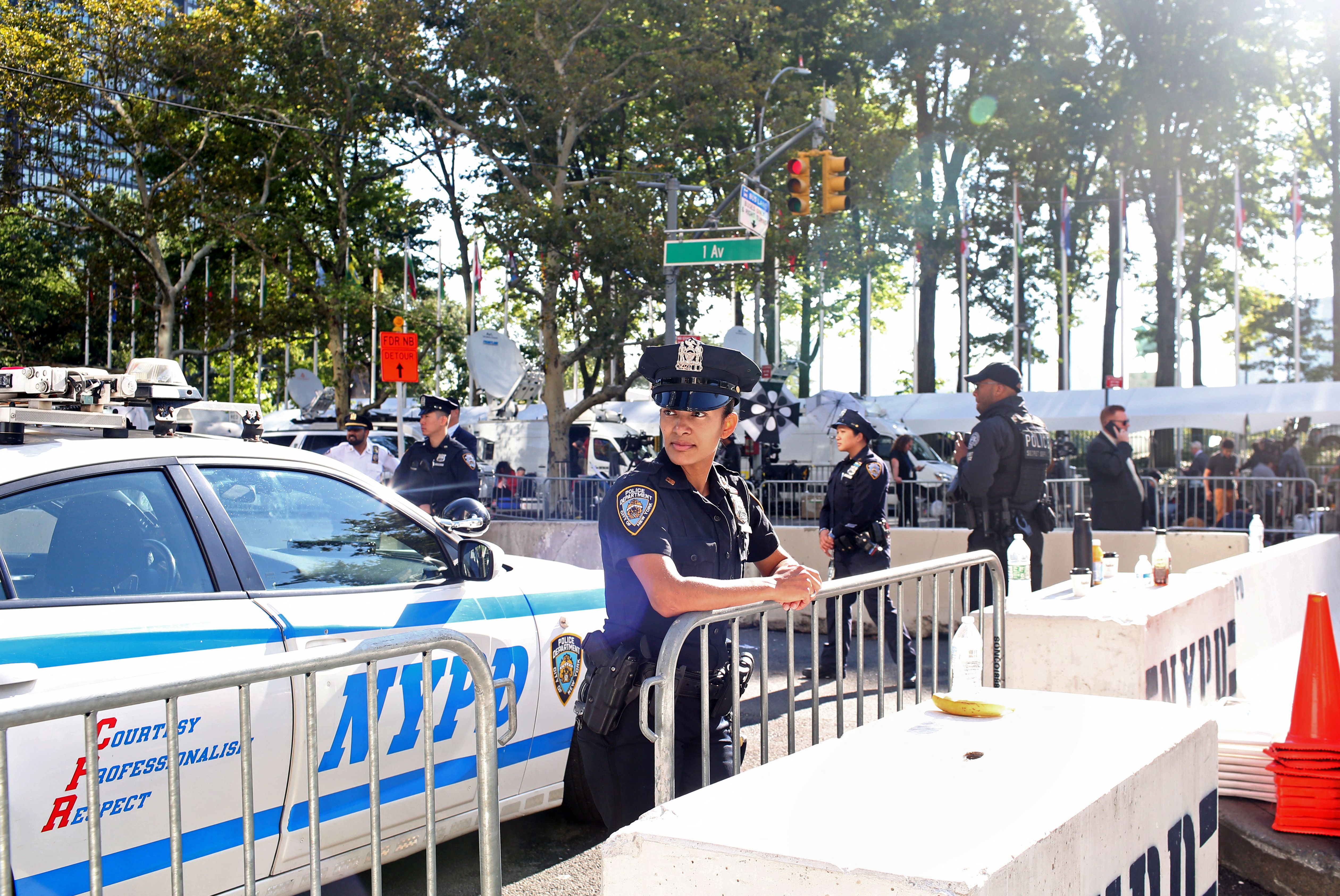 Law Enforcement officers stand guard in front of the United Nations headquarters during the visit of Iran's President Ebrahim Raisi in New York City, September 19, 2023. 