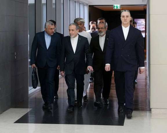 Iranian Foreign Minister Abbas Araghchi (center) arrives to meet with his Omani counterpart before Oman-mediated negotiations with the United States on February 6, 2026, in Muscat, Oman.