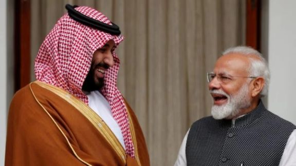 Saudi Arabia's Crown Prince Mohammed bin Salman and India's Prime Minister Narendra Modi react ahead of their meeting at Hyderabad House in New Delhi, India, February 20, 2019.