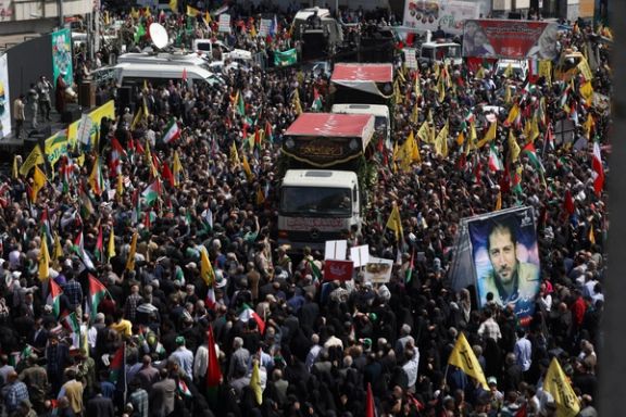 People gather for the funeral of members of the Revolutionary Guard who were killed in an Israeli airstrike on the Iranian consulate in the Syrian capital Damascus, on the same day as Quds Day in Tehran, Iran, April 5, 2024.