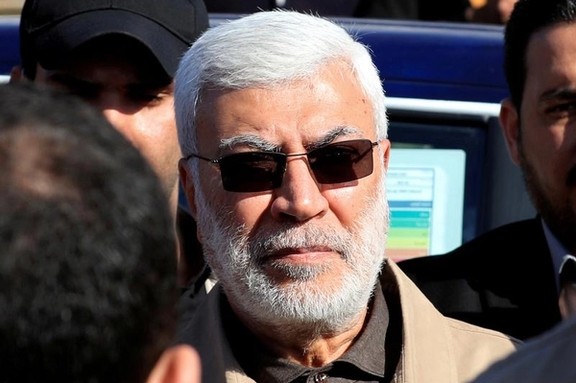Abu Mahdi al-Muhandis, a commander in the Popular Mobilization Forces, attends a funeral procession of Hashd al-Shaabi (paramilitary forces) members.