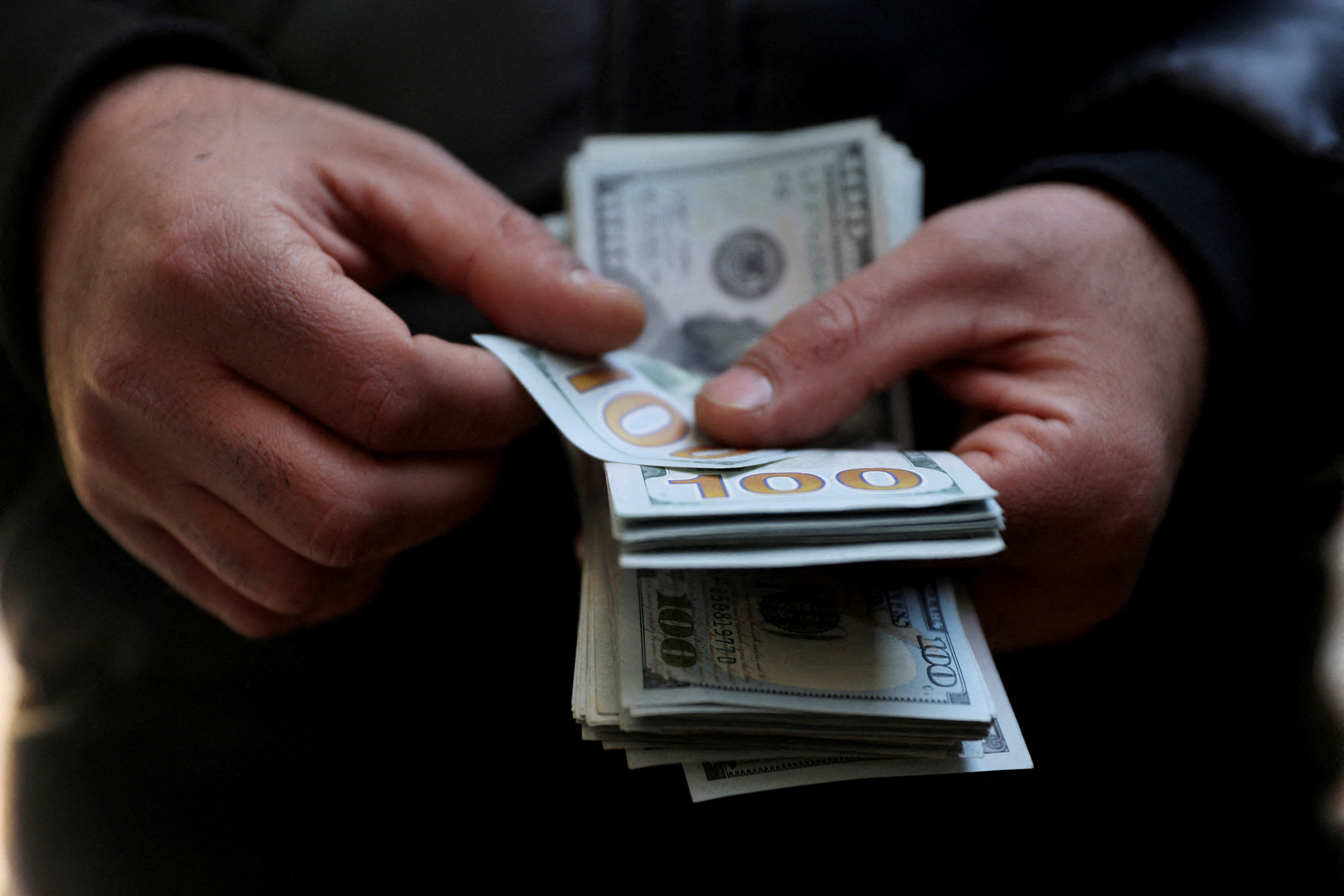 Iran’s currency slides to new low, dollar at 1.47 million rials