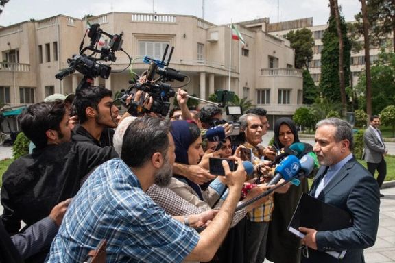 Iran's Foreign Minister Abbas Araghchi speaking to reporters in Tehran on May 14, 2025