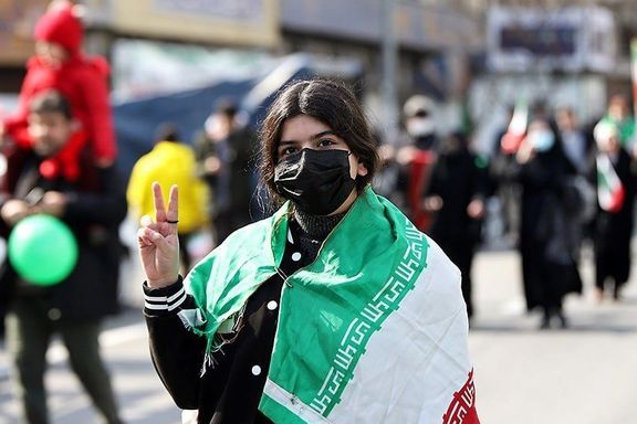 A young girl attending the rally to commemorate the anniversary of Iran's 1979 Revolution,