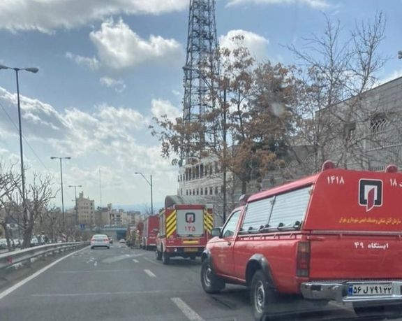 Fire trucks outside a telecommunication center in Tehran on Friday.