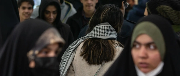An Iranian woman with loose hijab in Tehran