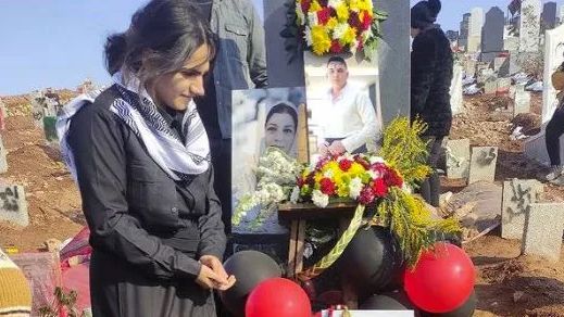 An Iranian woman at the grave of her loved ones on Valentine’s Day