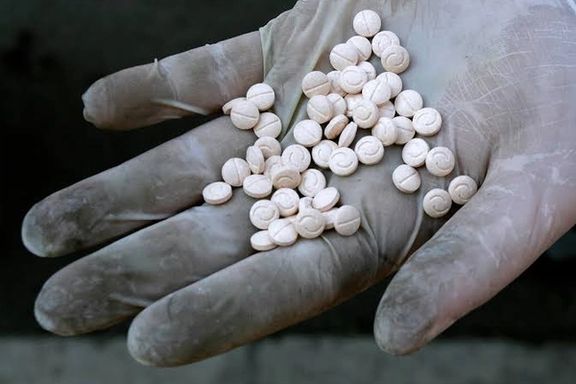 An officer displays Captagon pills before its incineration (file photo)