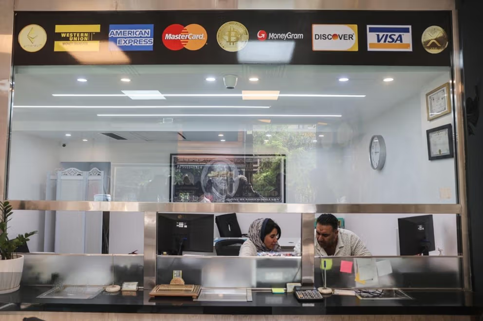 Iran currency slide sets fresh records as dollar passes 1.28m rials