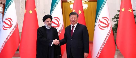 Iranian President Ebrahim Raisi shakes hands with Chinese President Xi Jinping during a welcoming ceremony in Beijing, China, February 14, 2023.