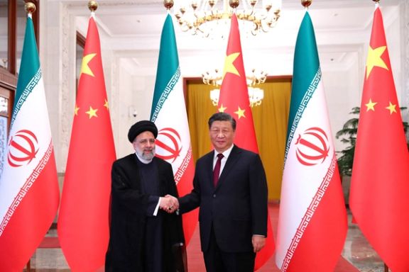 Iranian President Ebrahim Raisi shakes hands with Chinese President Xi Jinping during a welcoming ceremony in Beijing, China, February 14, 2023.