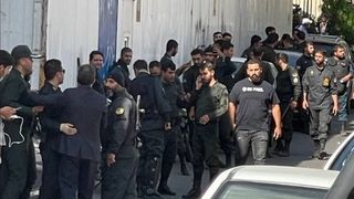 Who Are The Plainclothesmen Attacking Protesters In Iran?