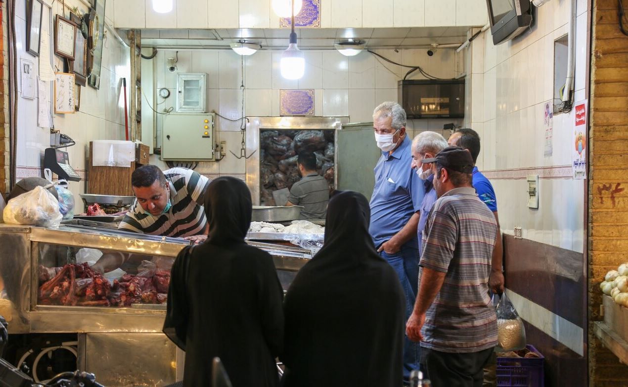 People shopping for food in Tehran. Undated