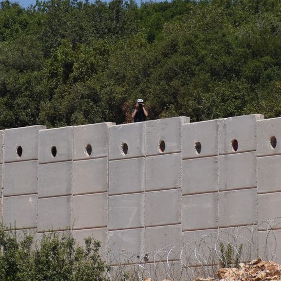 Hezbollah militant pictured in Lebanon near border with Israel