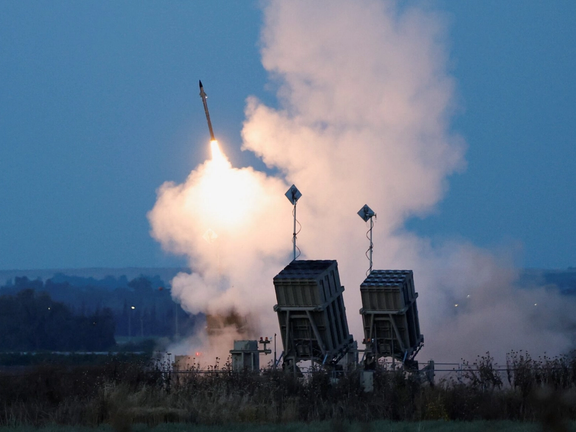 An Iron Dome launcher fires an interceptor missile as rockets are fired from Gaza, in Sderot, Israel, 2023