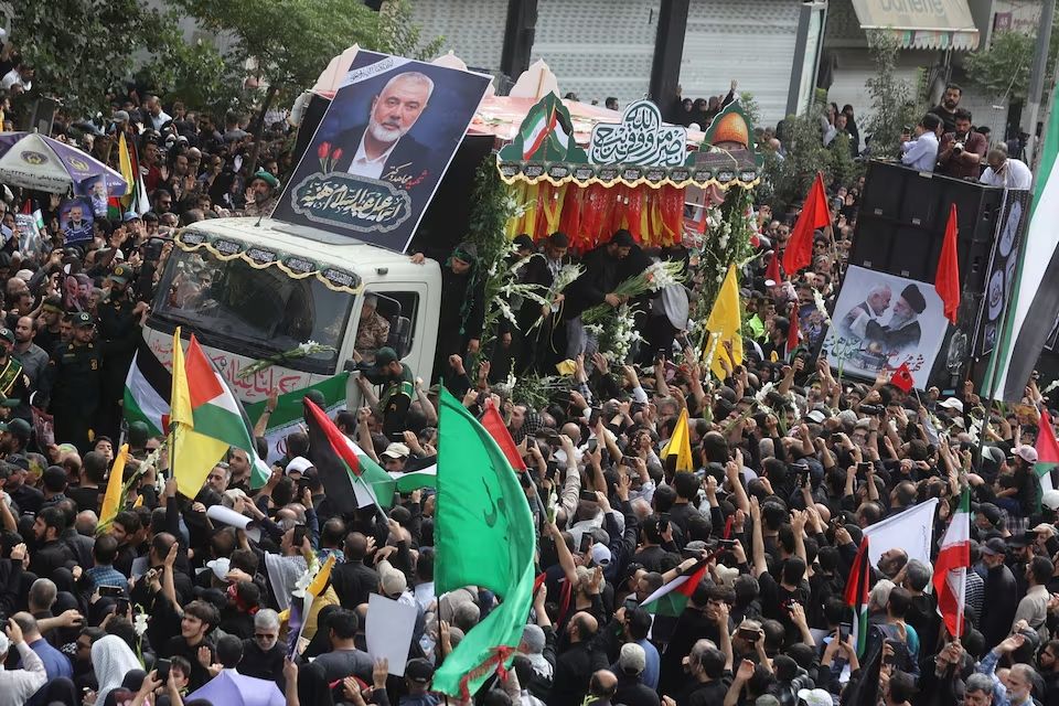 Iranians attend the funeral procession of assassinated Hamas chief, Ismail Haniyeh in Tehran, Iran, August 1, 2024.