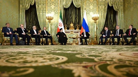 Russian President Vladimir Putin and Iranian President Ebrahim Raisi attend a meeting in Moscow, Russia December 7, 2023.