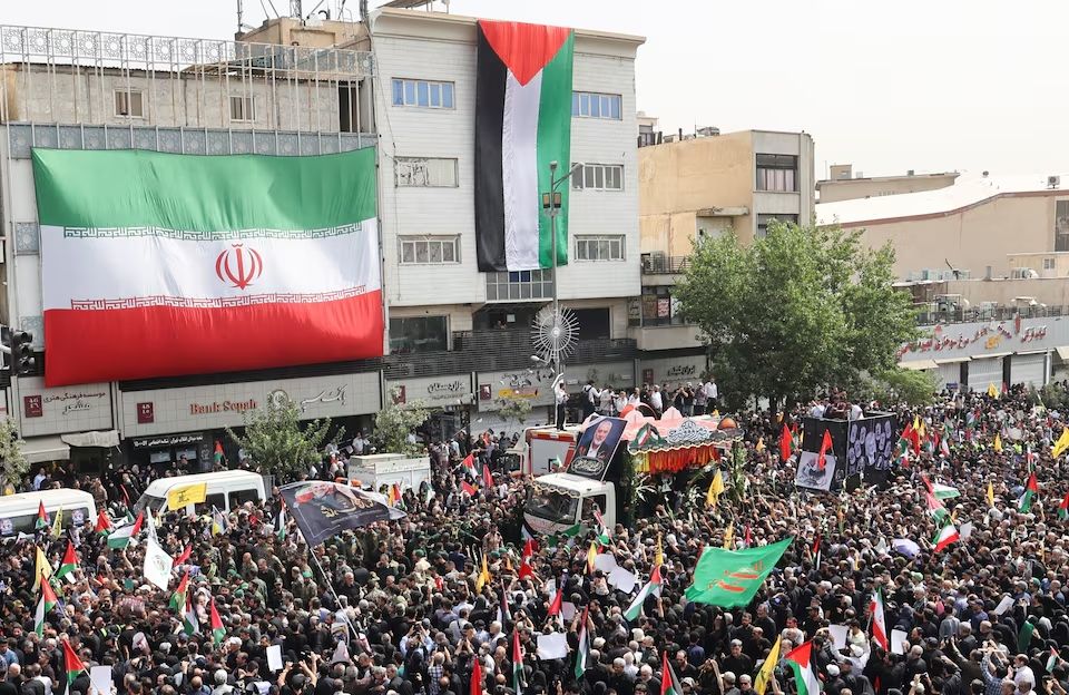 Iranians attend the funeral procession of assassinated Hamas chief, Ismail Haniyeh in Tehran, Iran, August 1, 2024.