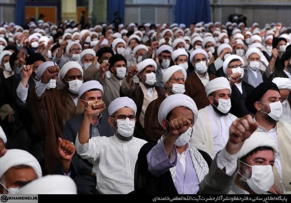 Clerics raising their fists in sign of support for Khamenei's statements. July 27, 2022
