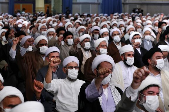 Clerics raising their fists in sign of support for Khamenei's statements. July 27, 2022