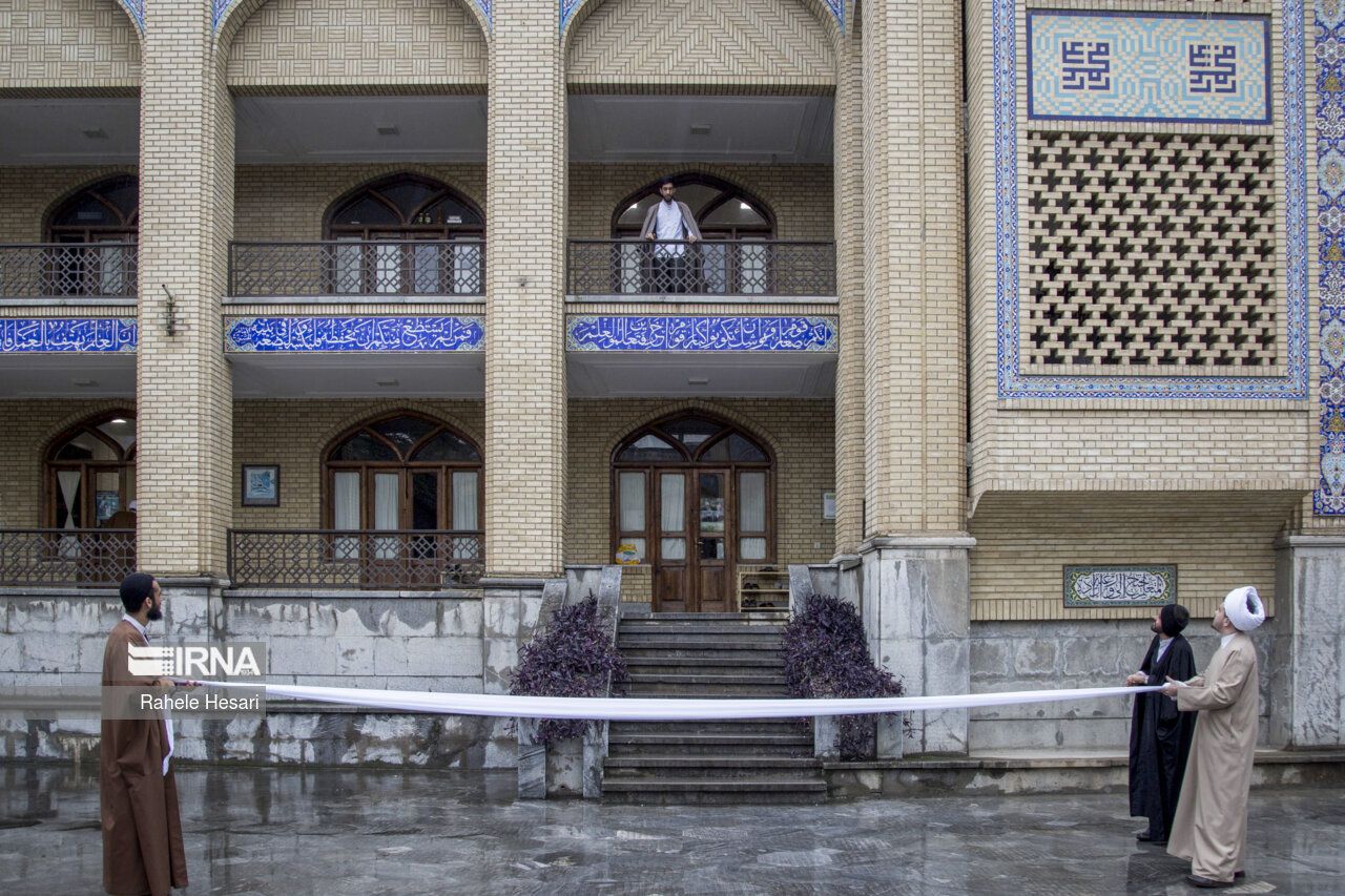 Two clerics preparing a turban for a ceremony where new mullahs are officially given the right to put on a turban, Gorgan, Golestan province, northern Iran (February 2024) 