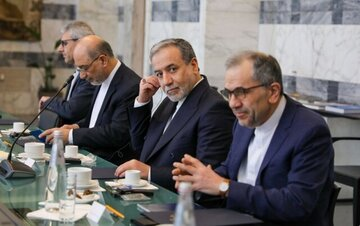 ranian negotiators Abbas Araghchi (center left), Foreign Minister, and Majid Takht-Ravanchi (right), engage in high-level diplomatic talks. (Undated)