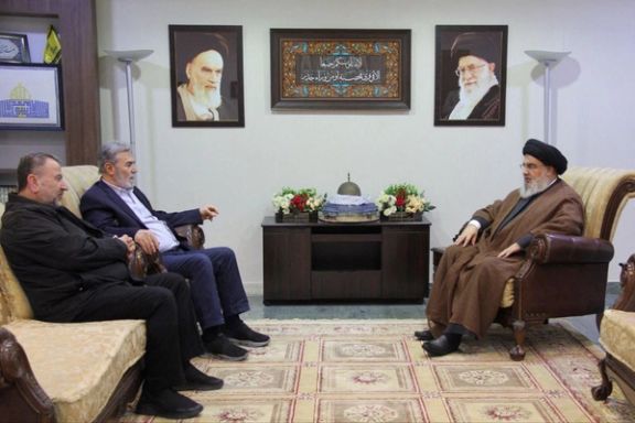 Lebanon's Hezbollah leader Sayyed Hassan Nasrallah meets Jihad Secretary General Ziyad al-Nakhalah and deputy leader of Hamas, Sheikh Saleh al-Arouri at an unidentified location in this handout image released on October 25, 2023.