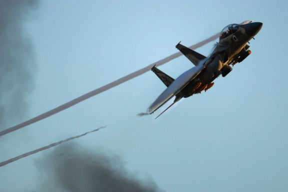 A F-15 fighter jet flies during a graduation ceremony for Israeli Air Force pilots at Hatzerim Airbase, in southern Israel, June 29, 2023.