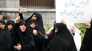Why did Iran's police crackdown on pro-hijab vigilantes?